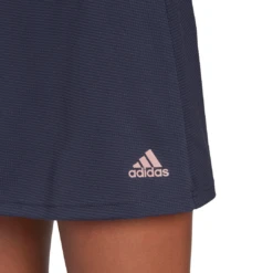 Adidas Women's Club Skirt (Shadow Navy/Wonder Mauve) -Racquet Guys Sports HE2975 APP on model detail 1 white